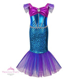 Girl's Little Mermaid style costume with shiny blue scale-print skirt, purple cap sleeves, and flared purple tulle tail fin
