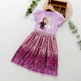 A Frozen-themed children's dress featuring a pastel pink top with printed images of Anna and Elsa and a vibrant purple sequined skirt, perfect for a playful princess look front view
