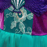 front bodice view Little Mermaid-inspired special occasion dress for girls in purple and teal with seashell details, flowing tulle skirt, and optional tiara and magic wand accessories. Perfect for birthdays, costume parties, and dress-up play.