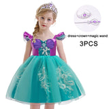 Little Mermaid-inspired special occasion dress for girls in purple and teal with seashell details, flowing tulle skirt, and optional tiara and magic wand accessories. Perfect for birthdays, costume parties, and dress-up play.